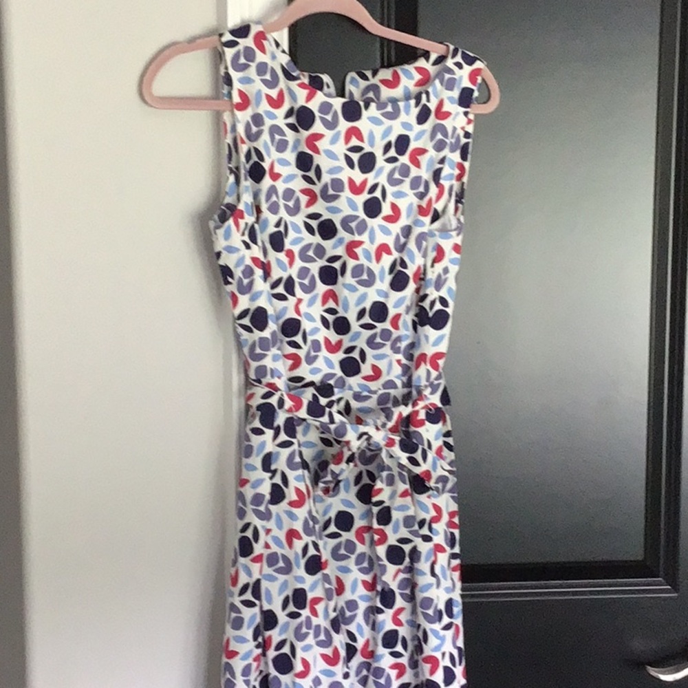 Anne Klein dress. Sleeveless. Zippered back. Side pockets, self tie belt.